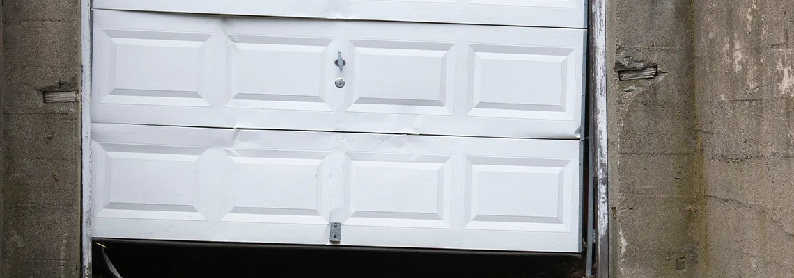 Garage Door Got Hit By A Car Dent Removal in Whitby, ON