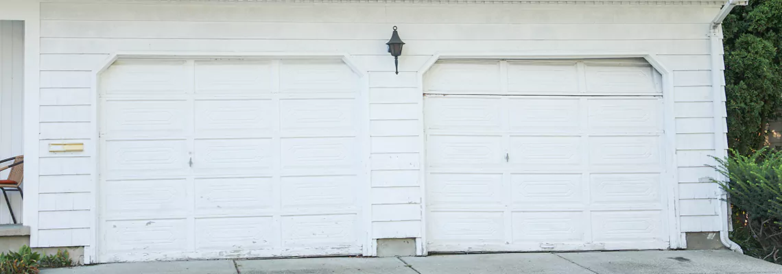 Roller Garage Door Dropped Down Replacement in Whitby, ON
