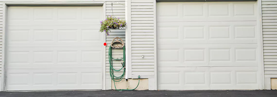 Sectional Garage Door Dropped Down Repair in Whitby, Ontario