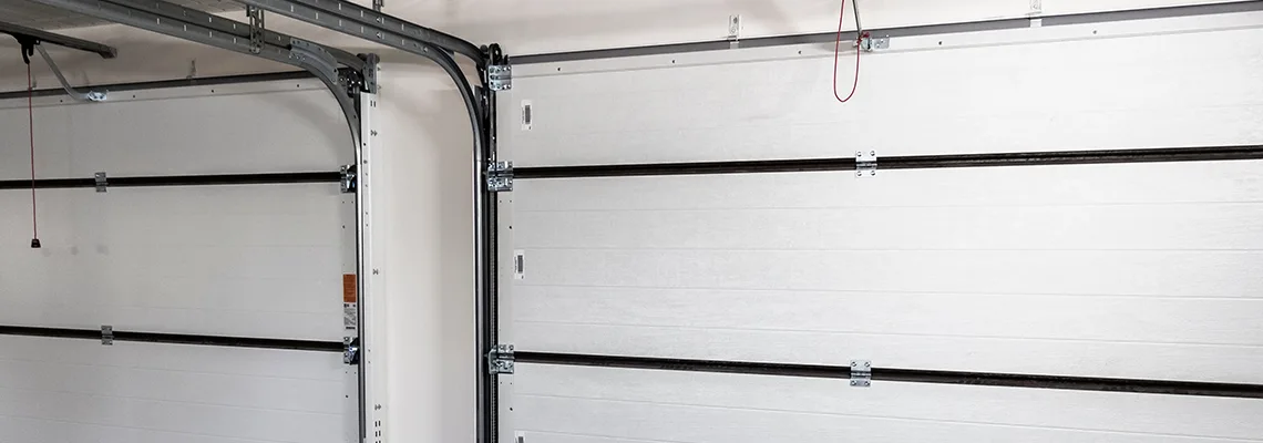 Fix Folding Garage Door Jerking in Whitby, Ontario