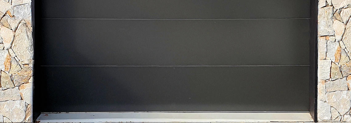 Overhead Black Garage Door Installation in Whitby, Ontario