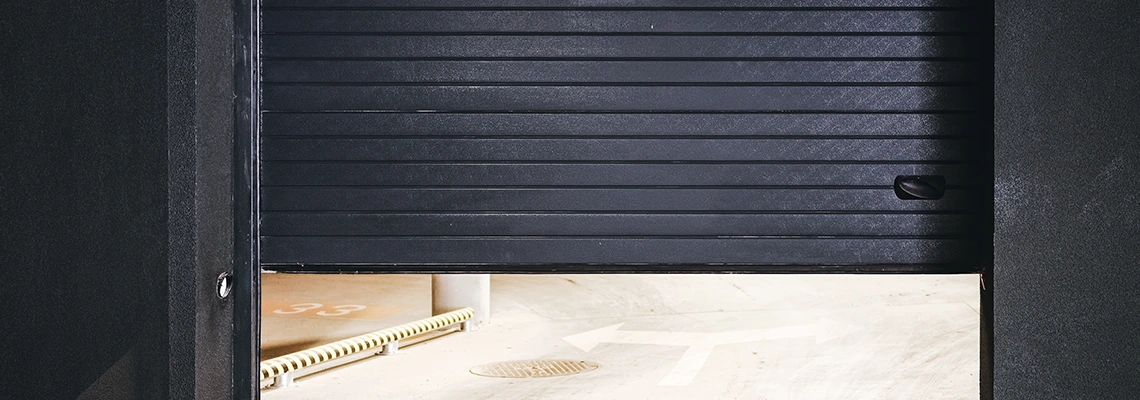 Residential Black Garage Door Installation in Whitby, ON