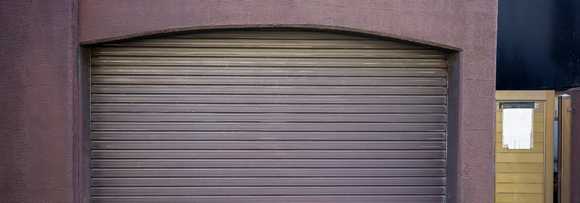 Fallen Garage Door Worn Rollers Replacement in Whitby, Ontario